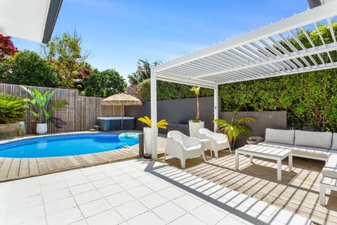 Private rear garden and deck with pool and spa