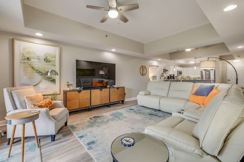 The main den gives your family and friends a spot to gather to watch a movie on our 75 inch Smart TV. Throws available and stored on the right side of the TV credenza.