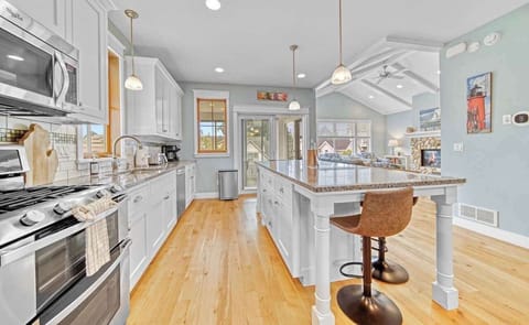 Kitchen looking toward 4 seasons porch and living room