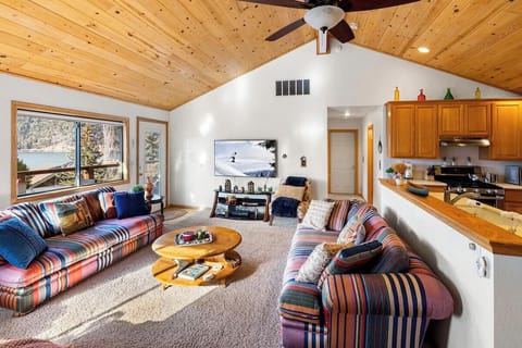 Living Room - Main Living Area w/ Plenty of Windows & Natural Light + LAKE VIEWS!