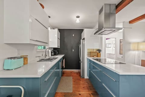 Bright kitchen with ample counter space and storage.