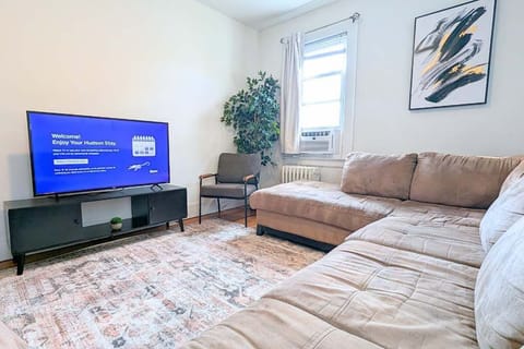 Kick back in comfort with a spacious sectional sofa and Smart TV—perfect for movie nights after exploring Newark or commuting from NYC.