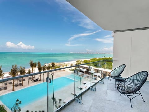 Soak in ocean breezes from your balcony above the pool.