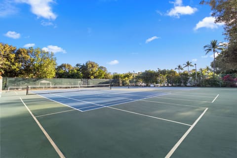 Serve up a match on the sunny on-site tennis court.