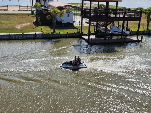 Jet ski passing on the canal