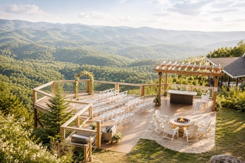 Panoramic mountain-view deck with fire pit and scenic ceremony space
