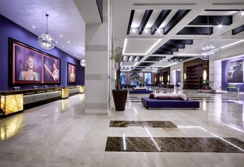 Arrive to a gleaming lobby with bold, modern glamour.