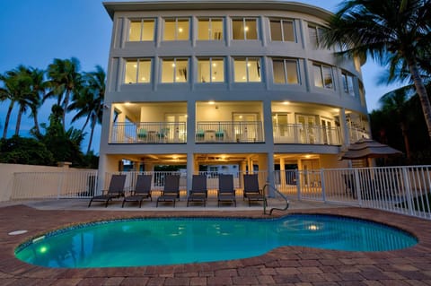 Pool and home sunset view