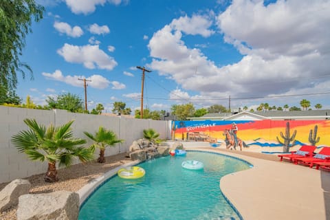 Make a splash in your private heated pool under the Arizona sun. Surrounded by desert landscaping and a vibrant Scottsdale mural, this oasis sets the stage for unforgettable days.