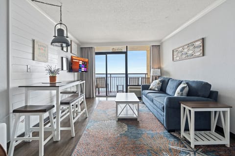Enjoy ocean views from the living room, Smart TV enabled