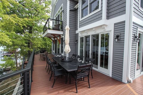 Host family dinners or gatherings with a large outdoor dining table and lake breeze as your backdrop.