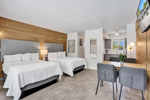 Gather comfortably with two plush beds and airy open space.