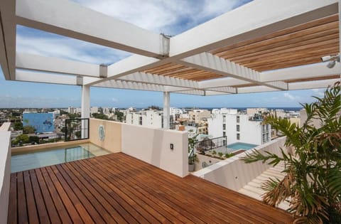 Soak up the sun or relax in the shade on the stylish rooftop deck with a view.