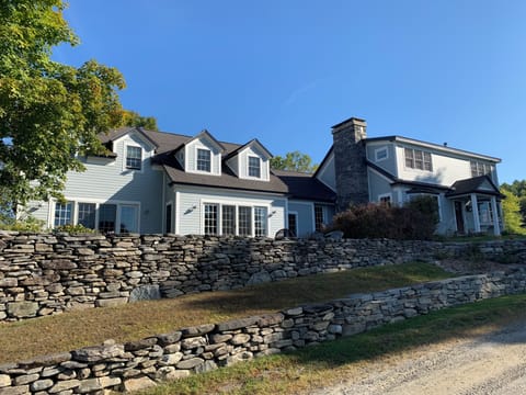 House & stone patio
