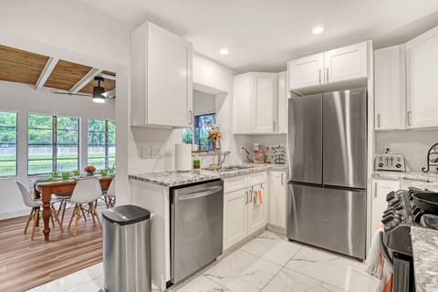 Our recently updated kitchen with Gas stove & oven, large French door refrigerator, microwave and dishwasher. Plus a full arrange of cookware with what you need to make family meals.