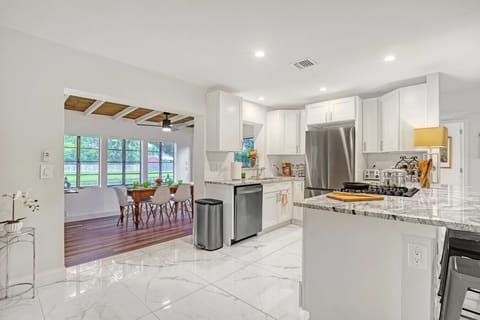 Full well stocked kitchen with gas stove & oven, and full of kitchen necessities to prepare your favorite meals