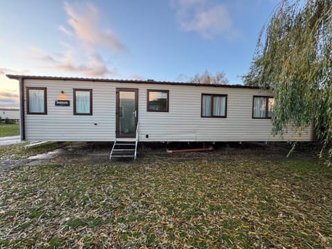 Cozy exterior with spacious yard for outdoor fun and relaxation