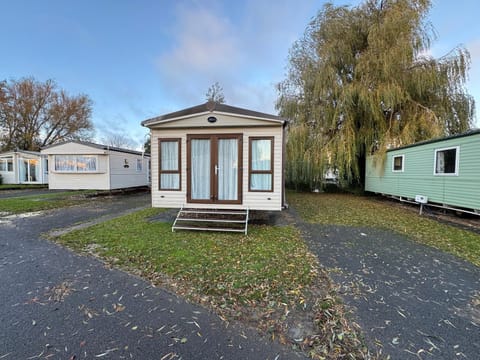 Cozy retreat with charming front porch and peaceful surroundings