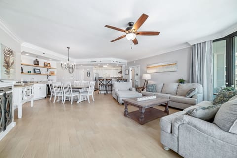 This thoughtfully designed living space maximizes natural light and integrates seamlessly with the surrounding environment. The open-concept layout and expansive windows create a bright and airy atmosphere.