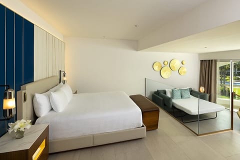Relax into a spacious bedroom with sleek, sunlit comfort.