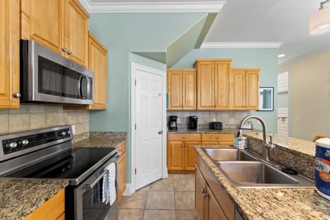 Come into the fully equipped kitchen with everything you could possibly need to feed the whole family.