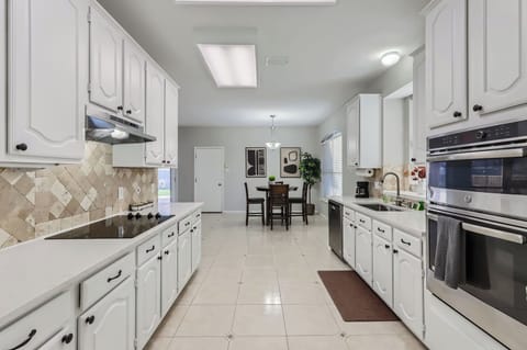 Whip up magic in a kitchen that’s all smiles and sizzle.