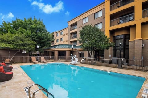 Dive into sunshine and unwind beside the sparkling outdoor pool.