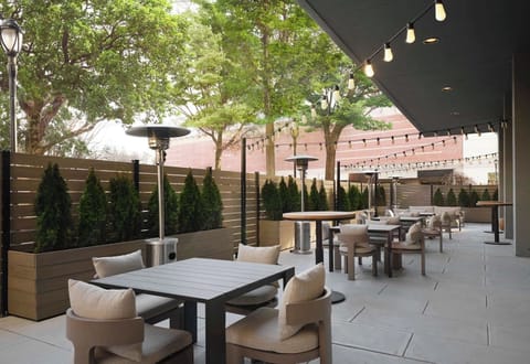 Sip coffee outside on the airy terrace with plenty of seating.