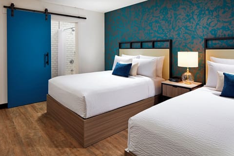 Unit with 2 Queen beds. Exact unit will be assigned upon arrival. Views, colors, and decor may vary.