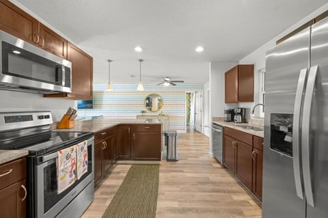 Whip Up Memories (and Meals!) Here! Our fully-equipped kitchen is ready for your culinary adventures, big or small! Who's on breakfast duty?