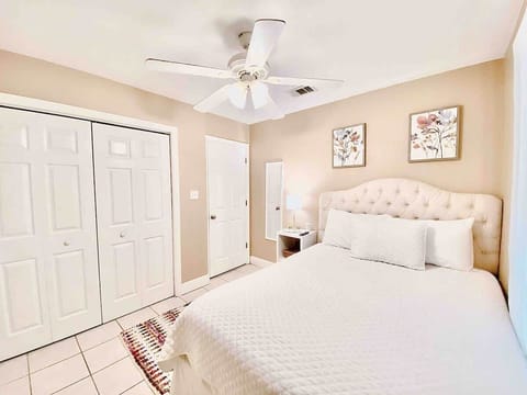Private Bedroom appropriate for two guests. Access to a outdoor patio overlooking the yard. 