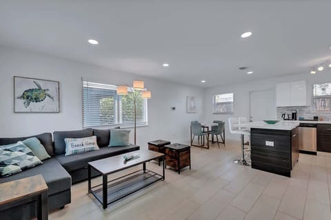 Cozy living room with smart TV and comfortable seating—perfect for relaxing or streaming your favorite shows.