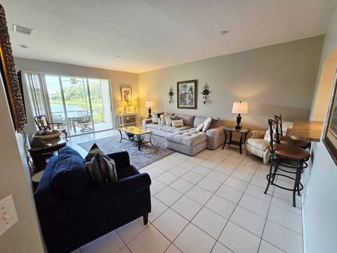 Relax in the spacious living room with comfy seating and a smart TV for your favorite shows.