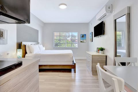 Cozy queen bed with hotel-quality linens for a restful night’s sleep.