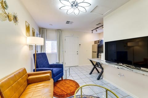 Cozy living space with comfortable seating and smart TV.