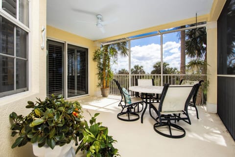 Screened lanai with outdoor dining table