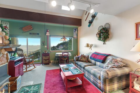 Living Room with Fireplace - Cozy living room with incredible lake and mountain views