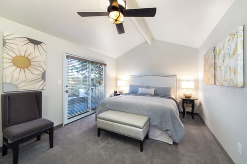 Unwind in a serene king retreat with private balcony views
