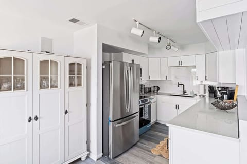 Fully equipped kitchen w/ ample counter space, great for cooking together.