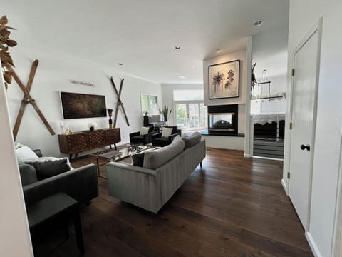 Welcome home! Living room as you enter. Connected to dining room and kitchen