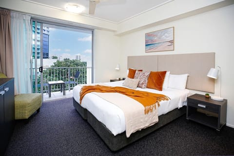 Spacious and accessible studio with a comfortable queen-size bed and a private balcony offering stunning views. Designed for ease and relaxation, perfect for solo travellers or couples looking for a peaceful stay in the heart of Cairns.