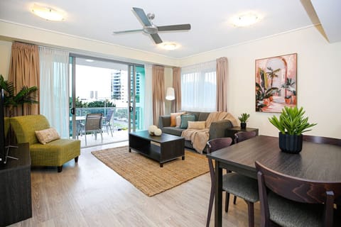 Relax in the bright and airy living room, complete with comfy seating, a flat-screen TV, and direct access to the private balcony. Perfect for unwinding after a day exploring Cairns or enjoying a quiet tropical evening in. Your holiday comfort zone.