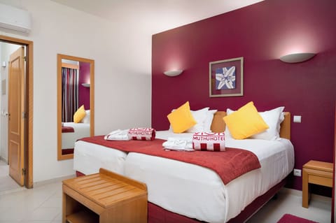 Sink into plush pillows and enjoy a restful night’s sleep.