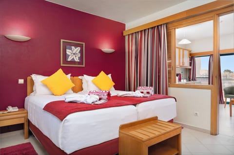 Unwind in crisp linens with a warm, colorful retreat.