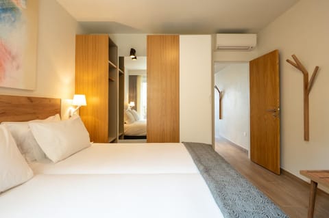 Get organized with roomy wardrobes and a calm, uncluttered feel