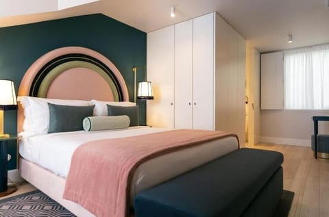 Stretch out with plush linens, generous wardrobes, and soft lighting.