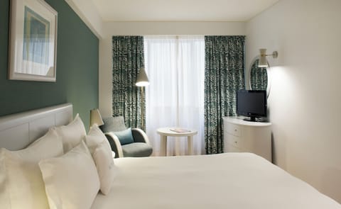Stretch out and enjoy a quiet night with in-room TV.