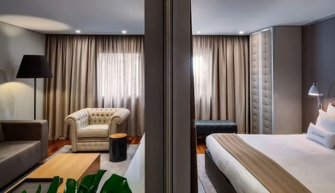 Lounge comfortably in the sitting area before sinking into bed.