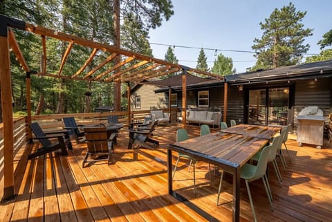 Enjoy time outdoors on the huge deck with plenty of seating, fire pit, and lighting