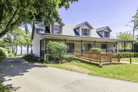 Welcoming front porch just steps from the lake